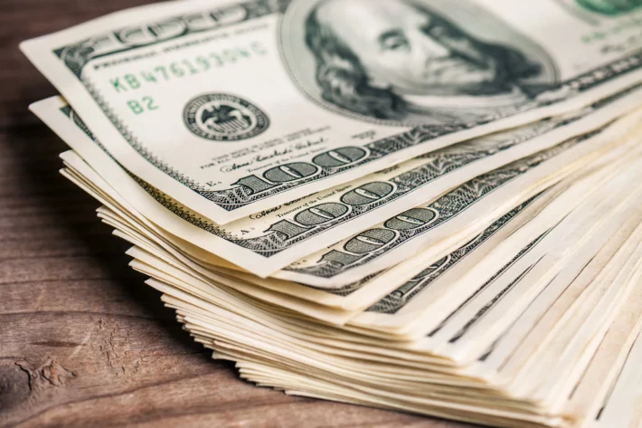 Nota de dólar americano. Foto: Adobe Stock