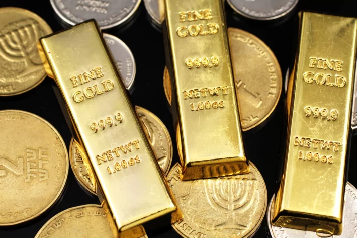 Contrato do ouro fecha em alta em sess&atilde;o com apetite por risco, ap&oacute;s queda no &uacute;ltimo preg&atilde;o. (Imagem: Adobe Stock)