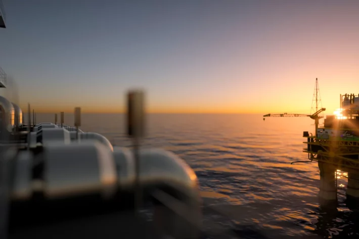 Petr&oacute;leo oscila acima de US$ 100 em meio &agrave; guerra no Oriente M&eacute;dio e acordo do Iraque, influenciando expectativas para juros do Fed e do Copom. (Imagem: Adobe Stock) 