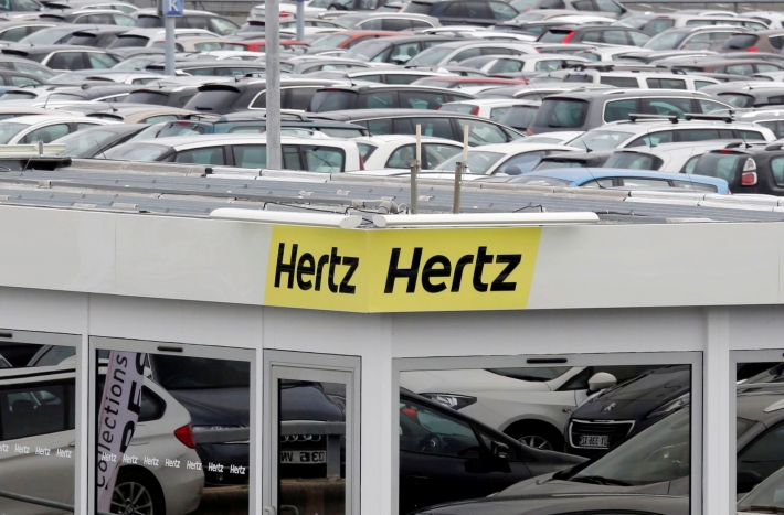 FILE PHOTO: A logo of the American car rental company Hertz is seen at Bordeaux Airport in Merignac, Southwestern France, February 4, 2016. REUTERS/Regis Duvignau/File Photo